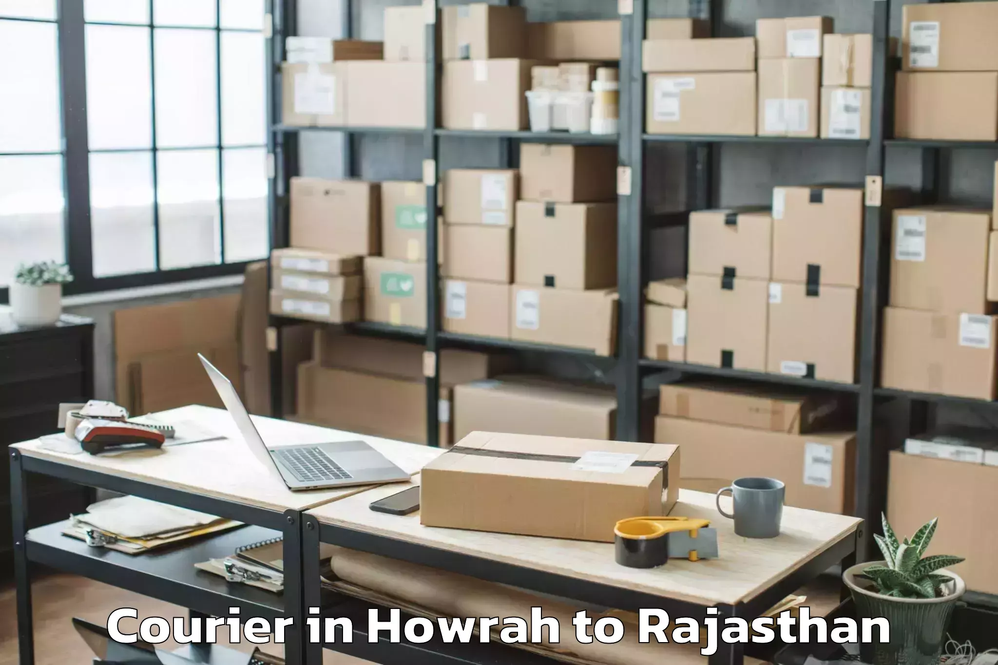 Book Howrah to Buhana Courier Online